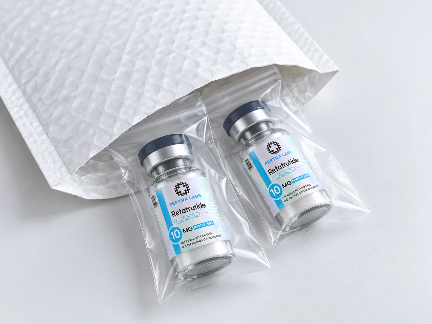 Padded envelope with sealed peptide vials, each in a clear bag